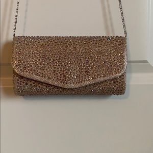 Sparkly rose gold clutch